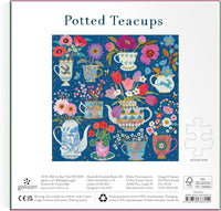 Potted Teacups – 500 Piece Foil Jigsaw Puzzle Featuring Beautiful Artwork Of Potted Teacups With Floral Background